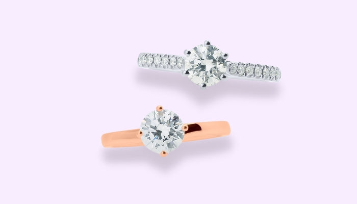 Rose gold 4 claw round brilliant solitaire engagement ring and a platinum 6 claw round brilliant with diamond shoulders